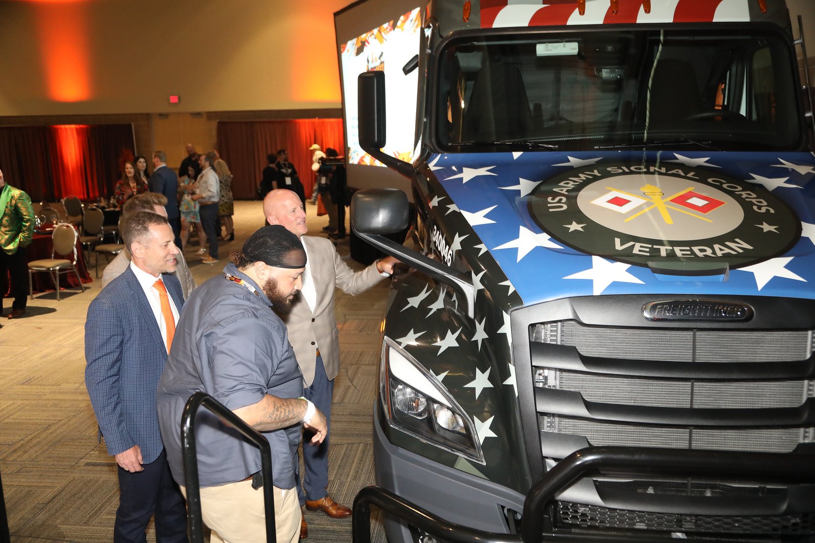 Jamil, Brad, & Richard looking at the newly designed wrap
